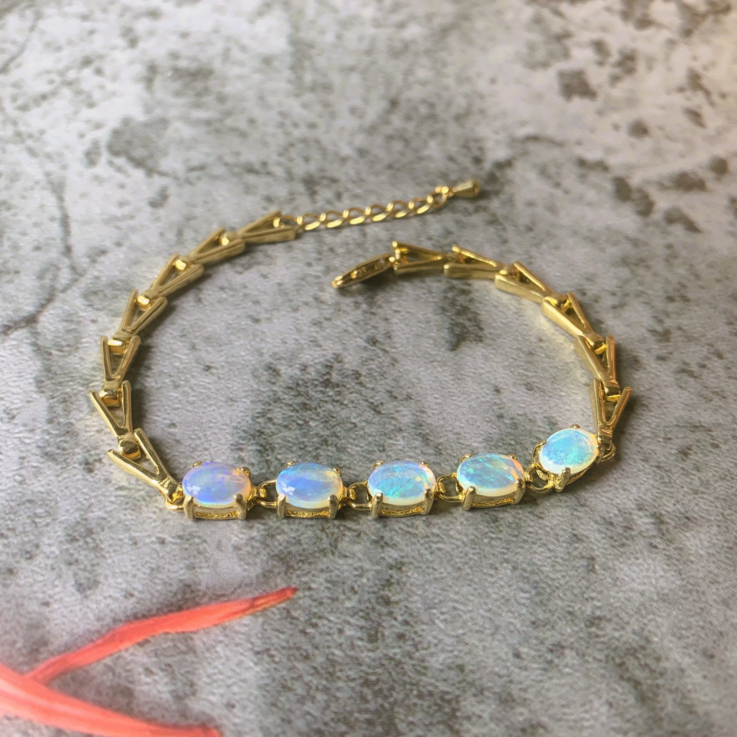 Gold plated silver 5 White opal 8x6mm bracelet