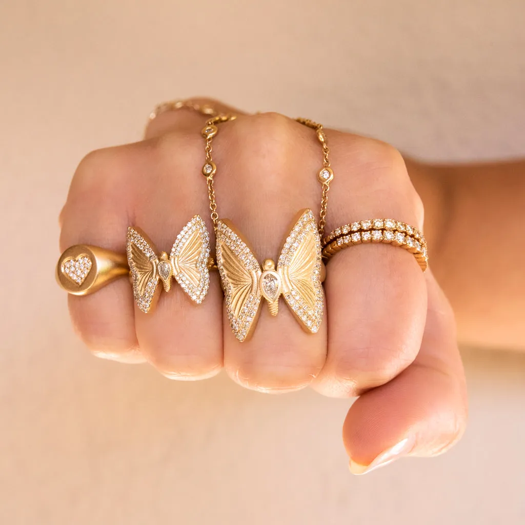 LARGE PAVE TEARDROP DIAMOND CENTER BUTTERFLY RING
